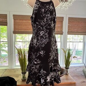 Christian Siriano New York. Black and white floral dress with ruffle detail.